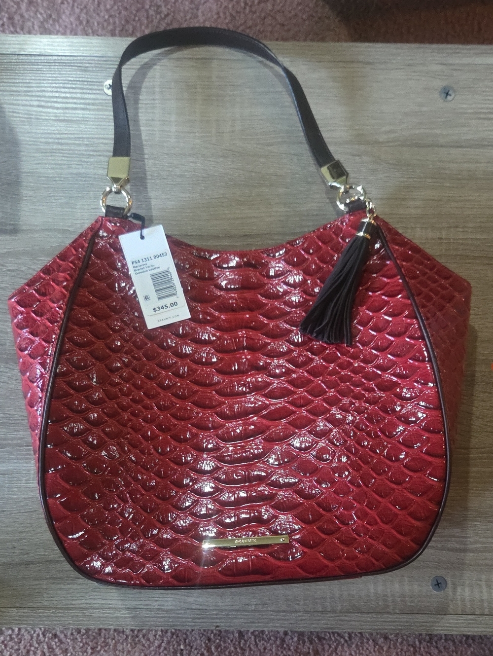 Glossy Red Croc-Embossed Shoulder Bag with Tassel Accent